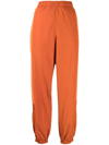 Y-3 Contrasting-panel Tracksuit Bottom In Orange