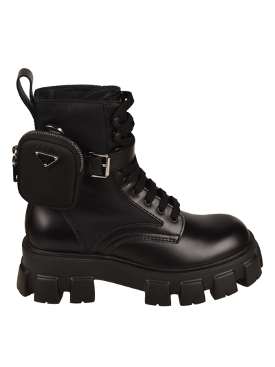 Prada Strapped Pouch Combat Boots In Black