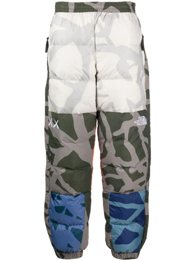 The North Face X Kaws Retro 1996 Padded Trousers In Neutral