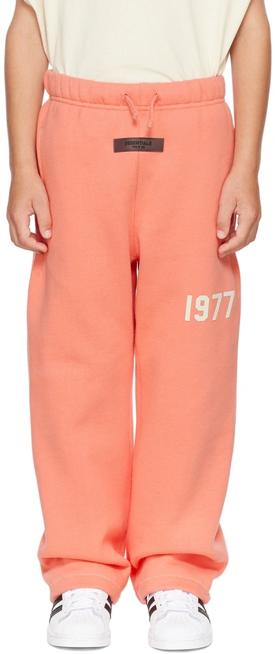 Essentials Kids Pink '1977' Relaxed Lounge Trousers In Coral