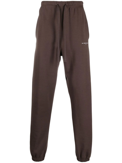 Ih Nom Uh Nit Logo-print Detail Track Trousers In Braun