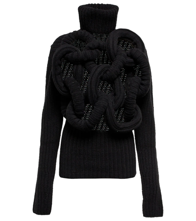Jw Anderson Tubular Cutout Merino Wool Turtleneck Sweater In Black
