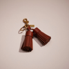 Coach Remade Tassel Bag Charm In Brown