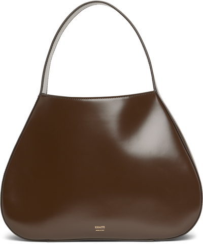 Khaite Small Ada Patent Leather Hobo Bag In Brown