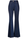 Patou Flared Denim Trousers Featuring Gold-tone Hardware In Blue