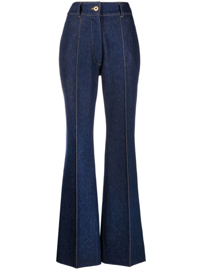 Patou Flared Denim Trousers Featuring Gold-tone Hardware In Blue