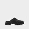 Ganni Recycled Rubber City Mules In Black In Black