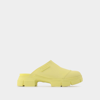 Ganni Yellow Recycled Rubber Retro Mules In Yellow