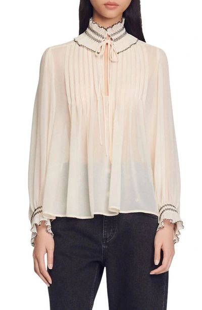 Sandro Jacinthe Frilled-neck Pleated Chiffon Blouse In Nackt