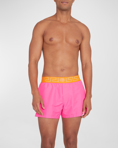 Versace Pink Greca Border Swim Shorts In Neon Pink Neon Orange