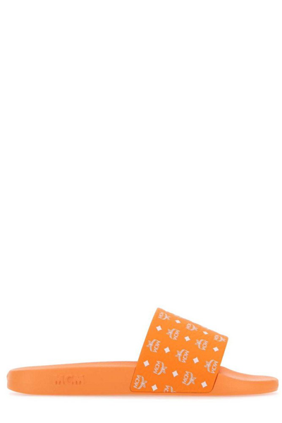 Mcm Men's Monogram Print Rubber Slides In Orange