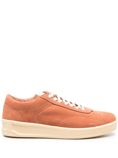 Jil Sander Embossed-logo Lace-up Sneakers In Orange