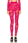 Alaïa Fishnet Leggings In Fuchsia