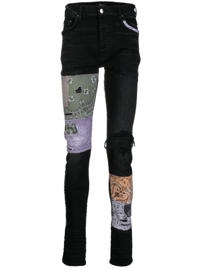 Amiri Distressed Patchwork Skinny Jeans In Schwarz