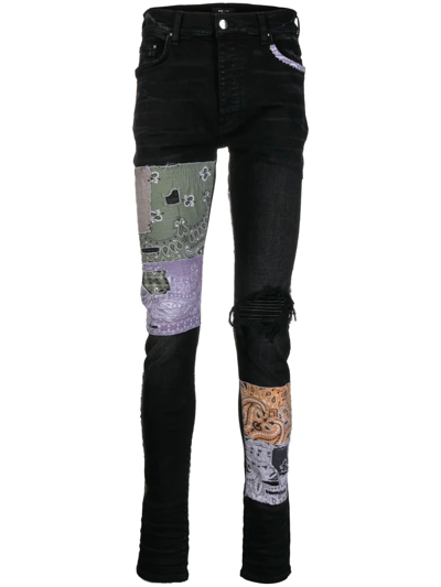 Amiri Distressed Patchwork Skinny Jeans In Black