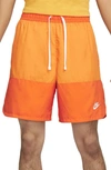 Nike Men's  Sportswear Sport Essential Woven Lined Flow Shorts (long) In Magma Orange/kumquat/white