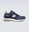 NEW BALANCE 2002R SUEDE SNEAKERS