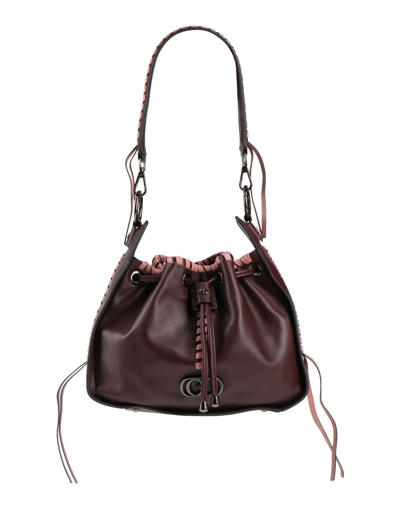 La Carrie Handbags In Brown