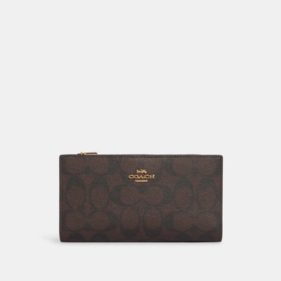 Coach Outlet Slim Zip Wallet In Signature Canvas In Brown