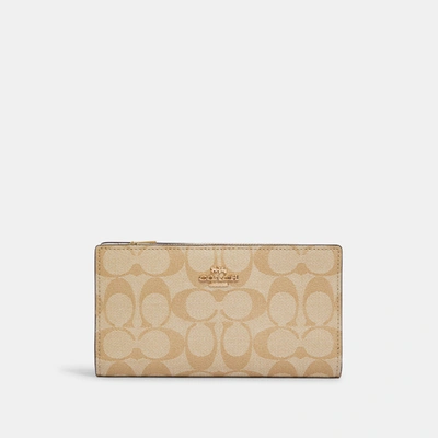 Coach Outlet Slim Zip Wallet In Signature Canvas In Beige