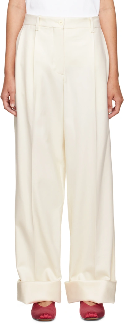 The Row Cassandro Pleated Stretch-wool Tapered Trousers In Cream