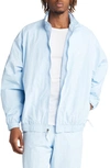 Nike Sportswear Solo Swoosh Nylon Track Jacket In Celestine Blue/ White