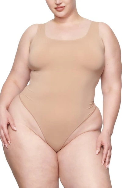 Skims Soft Smoothing Thong Bodysuit In Sienna