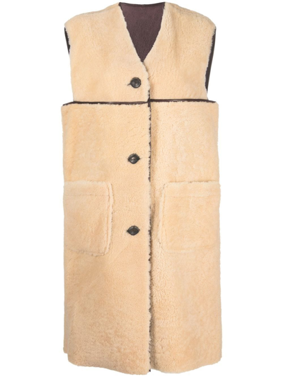 Marni Reversible Shearling And Leather Sleeveless Coat In Nude