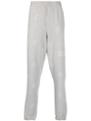 MARTINE ROSE ALL-OVER LOGO-PRINT TRACK trousers