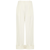 The Row Cassandro Pleated Stretch-wool Tapered Pants In Cream