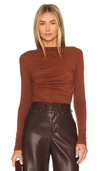 Enza Costa X Revolve Jersey Twist Top In Cognac