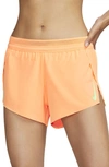 Nike Aeroswift Pleated Neon Stretch-shell Shorts In Orange