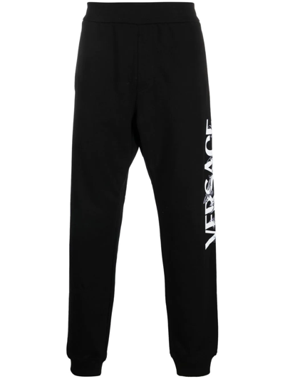 Versace Logo-print Slim-cut Track Pants In Schwarz