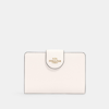 Coach Outlet Medium Corner Zip Wallet In Gold