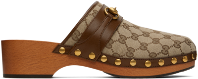 Gucci Horsebit Leather-trimmed Monogrammed Canvas Clogs In Beige