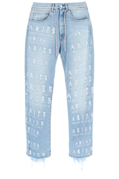 Aries Distressed Lettering Motif Jeans In Light Blue,blue