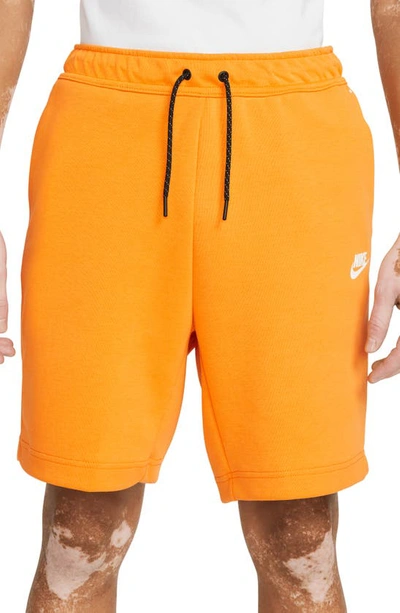 Nike Sportswear Tech Fleece Shorts In Kumquat/ White
