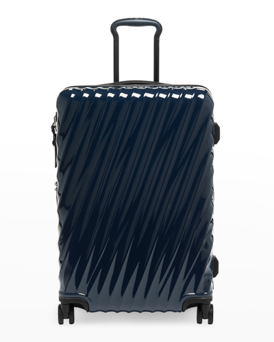 TUMI 4-WHEEL EXPANDABLE SUITCASE