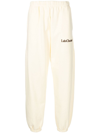 LATE CHECKOUT EMBROIDERED-LOGO TRACK trousers