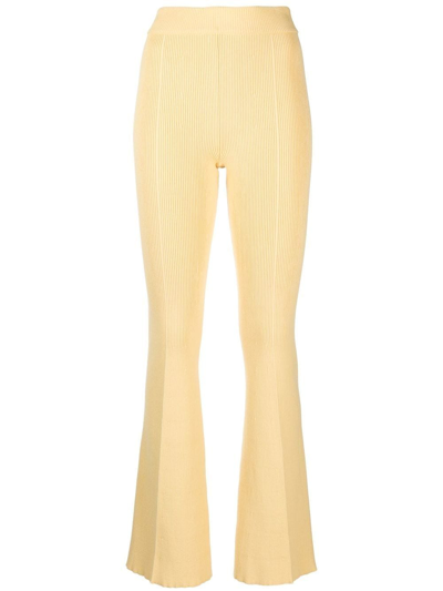 Aeron Egon Rib-knit Flared Trousers In Yellow