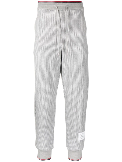 Thom Browne Herringbone-pattern Logo-patch Track Pants In Grau