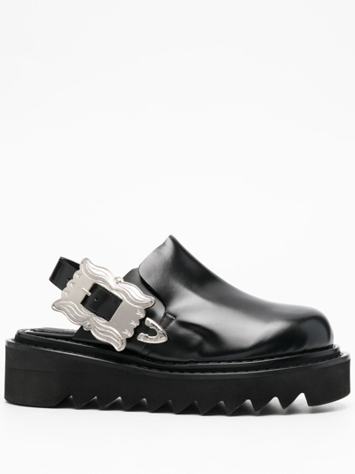 Toga Buckled Leather Mules In Schwarz