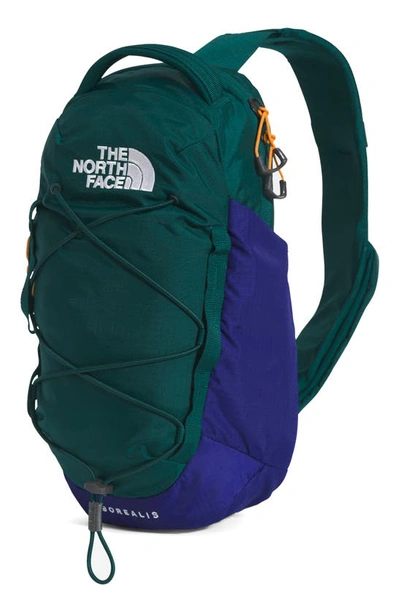 green and blue north face backpack The Women's Borealis Commuter Laptop Backpack, Algae Blue/Midnight Petrol, One Size and the padded laptop sleeve protects laptops from bumps and falls The North Face Basin 24L