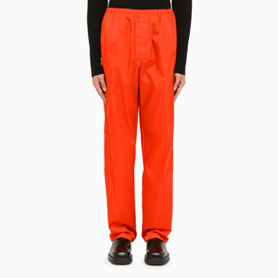 Prada Re-nylon Trousers In Orange