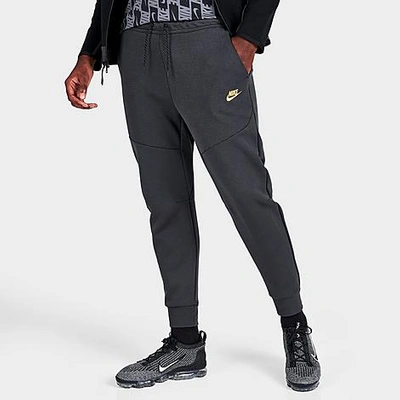 Nike Tech Fleece Taped Jogger Pants In Dark Smoke Grey/metallic
