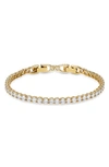 Swarovski Gold-tone Crystal Tennis Bracelet In Gold Tone,white