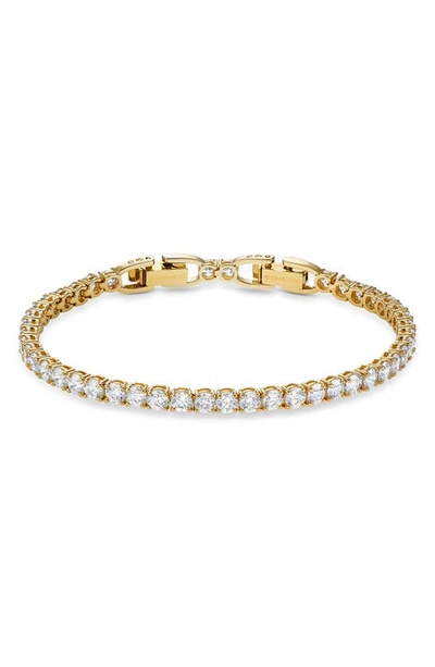 Swarovski Gold-tone Crystal Tennis Bracelet In Gold Tone,white