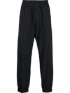 Moncler Zip-fastening Compartment Trousers In Black