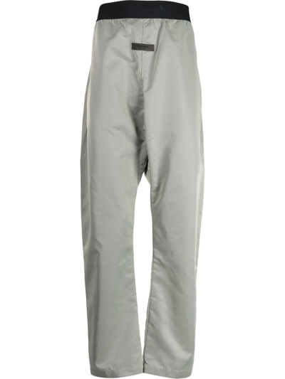 Essentials Relaxed Tecnical Track Pants In Green