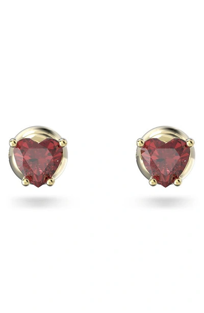 Swarovski Stilla Yellow-gold Toned Brass And Zirconia Stud Earrings In Red